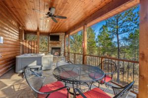 The back deck of a Hochatown cabin to relax on while drinking spirits from local Oklahoma distilleries.